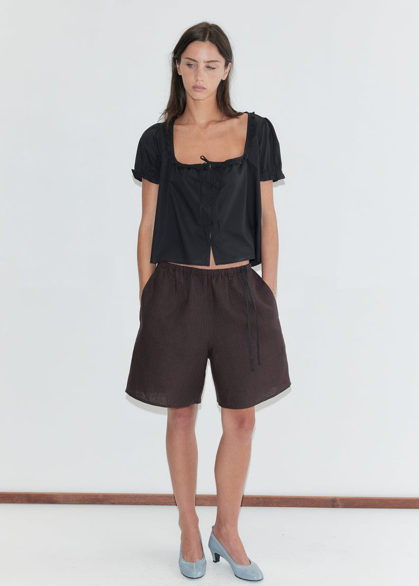 260107_DEIJI_09_FLOUNCE_FRILL_TOP_BLACK_MID_LINEN_SHORT_BROWN_BLACK_STRIPE_8196_026b2a95-e271-450d-976e-b0c56666caf8.jpg