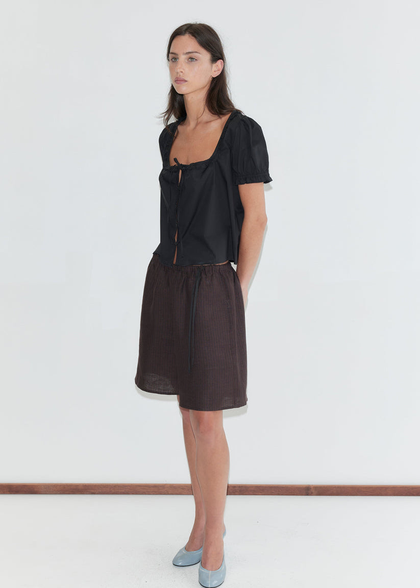 260107_DEIJI_09_FLOUNCE_FRILL_TOP_BLACK_MID_LINEN_SHORT_BROWN_BLACK_STRIPE_8206_a3a07de0-6a79-454a-9563-ed72a52f89f7.jpg