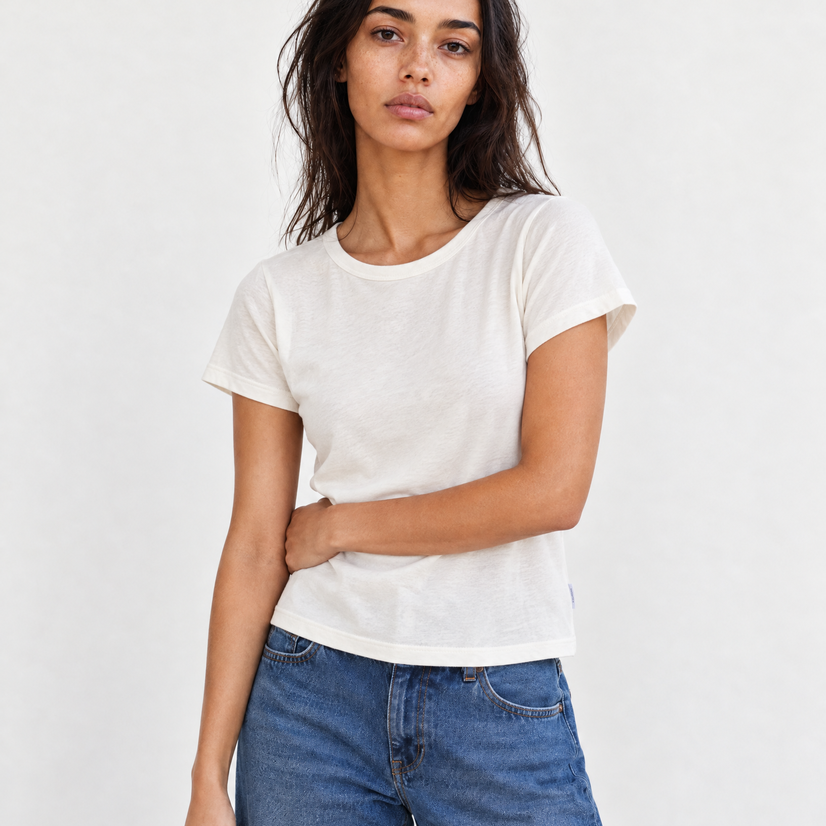 Generated_with_Kive.ai_-_Use_Image_1_as_the_continuing_canvas._Replace_the_red_t-shirt_with_the_exact_Le_Bon_Shoppe_Little_Boy_Tee_in_Vintage_White_shown_in_Image_2__preserving_its_vi.png
