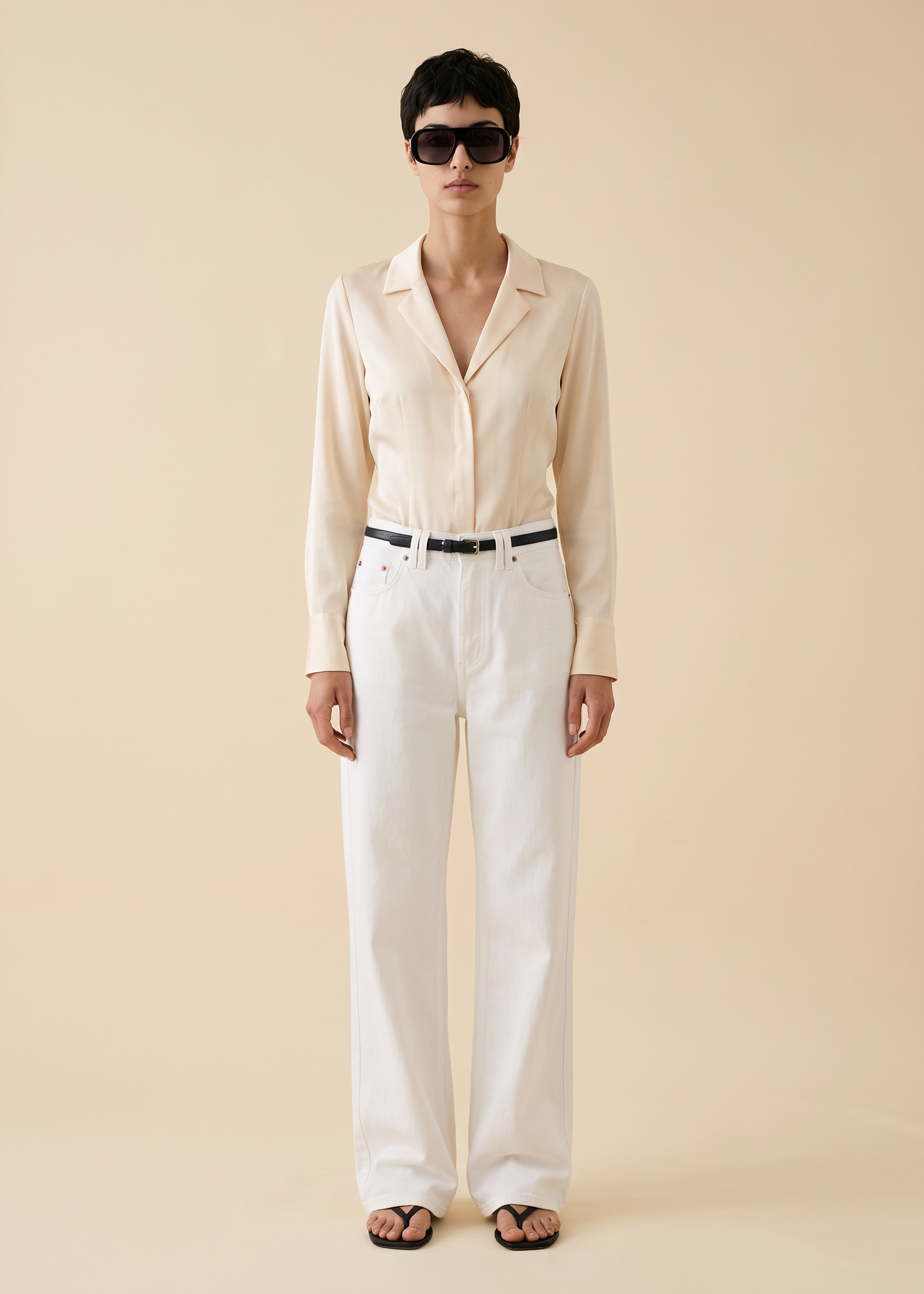 Generated_with_Kive.ai_-_Vintage_Donna_Karan_Cream_Silk_Bodysuit_Ines_Create_a_full-body_fashion_image._Image_1_is_the_outfit_reference_only_keep_the_white_wide-leg_trousers__black_be.png
