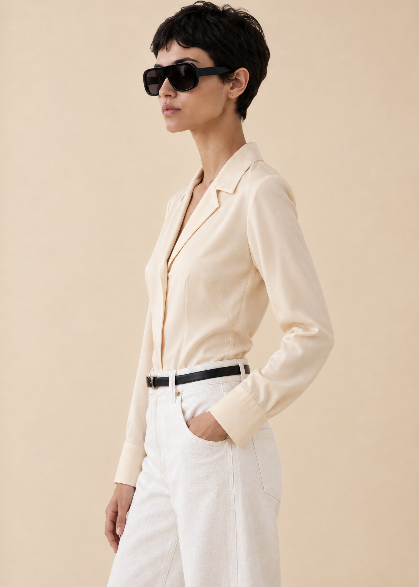 Generated_with_Kive.ai_-_Vintage_Donna_Karan_Cream_Silk_Bodysuit_Ines_Create_a_tighter_fashion_portrait_of_Ines_in_the_same_side-profile_outfit_as_Image_1._Image_1_is_the_reference_fo.png