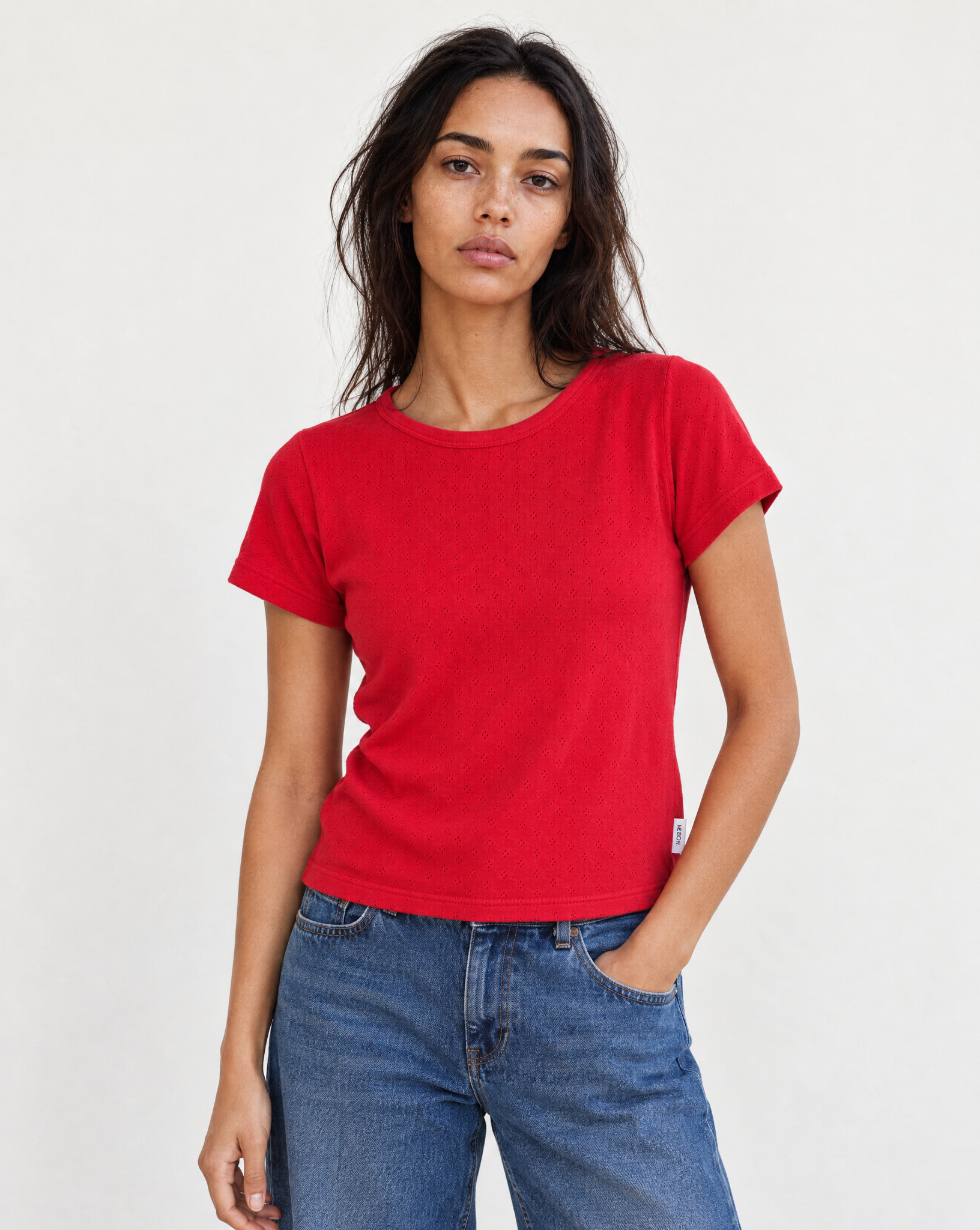 Generated_with_Kive.ai_-_Yara_wearing_Le_Bon_Shoppe_Pointelle_Babe_Tee_in_Red_Apple_in_a_fresh_minimal_studio_fashion_portrait._Clean_off-white_backdrop__soft_diffused_natural_light.png